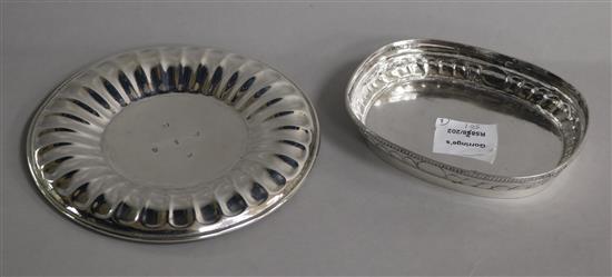 A George III silver circular dish/stand, Thomas Hobbs, London, 1804 and a later Scottish silver dish/base.